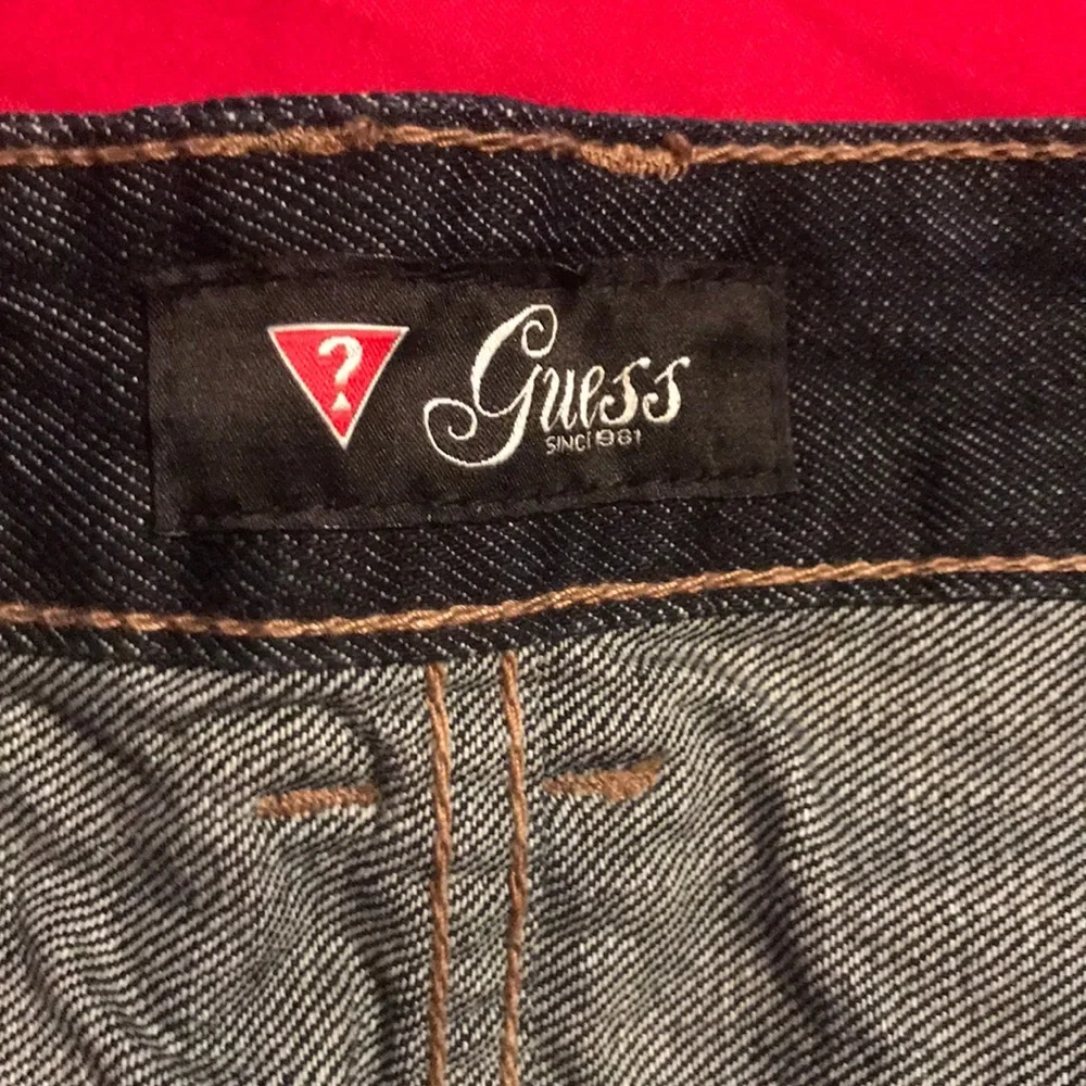 Guess denim mini skirt size 34.